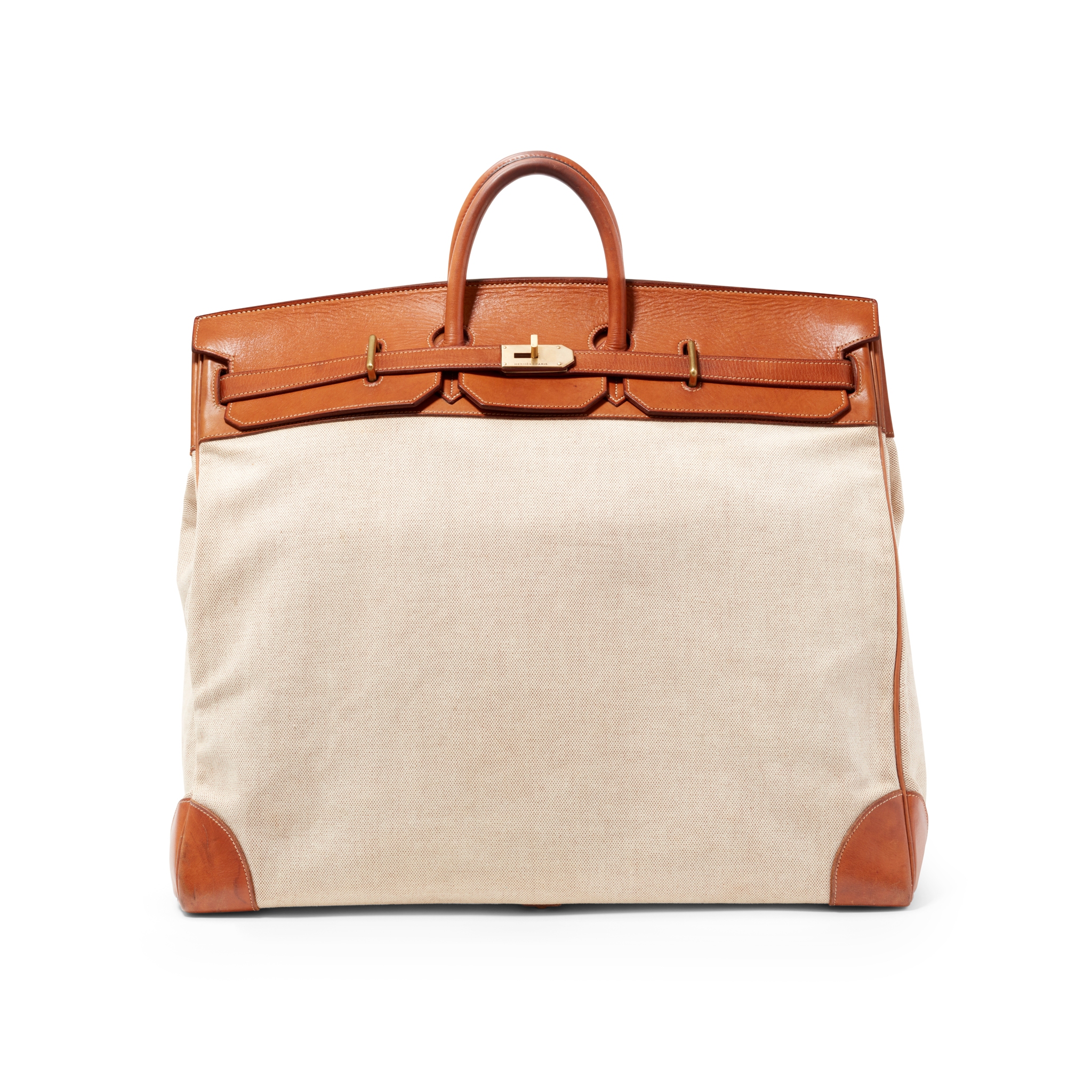 Hermes: A Natural Barenia Leather and Toile Haute à Courroies 55 Bag