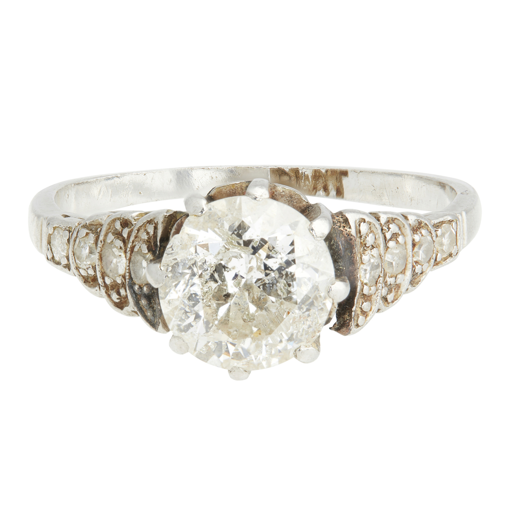 A 1920s single stone diamond ring