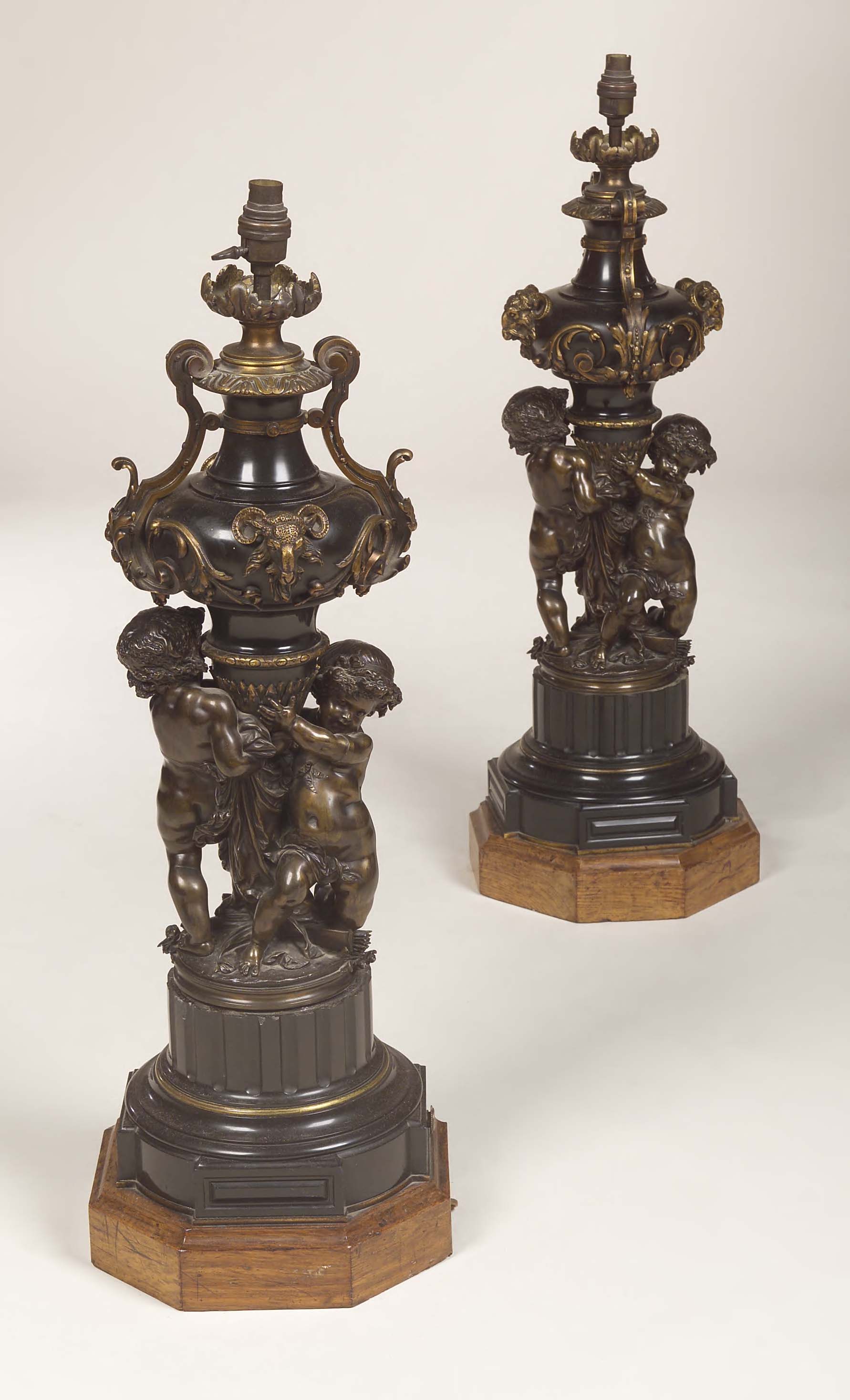 A pair of large bronze lamp bases in a Renaissance manner, after Claude Michel Clodion,