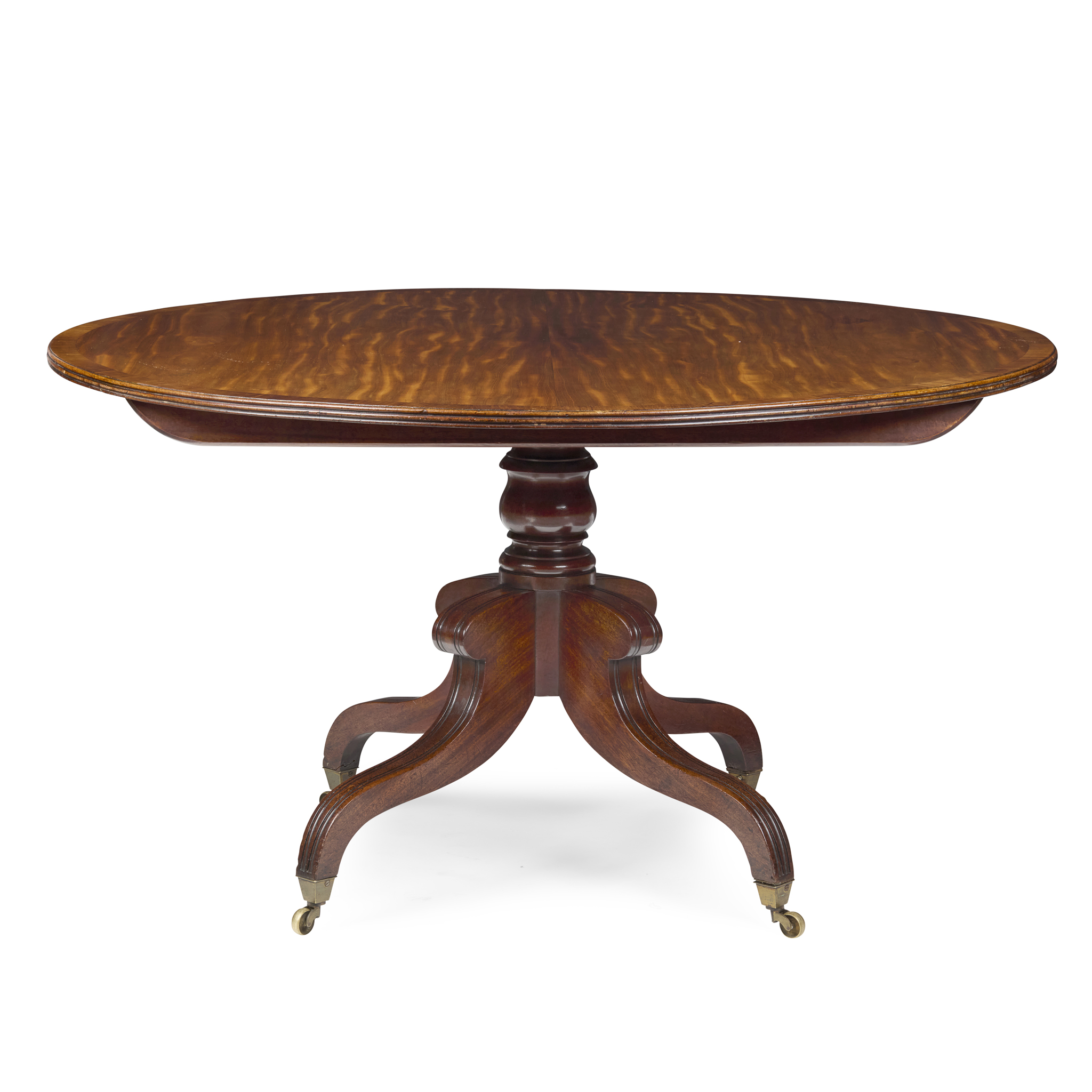 LATE GEORGE III MAHOGANY AND ROSEWOOD BREAKFAST TABLE, IN THE MANNER OF GILLOWS