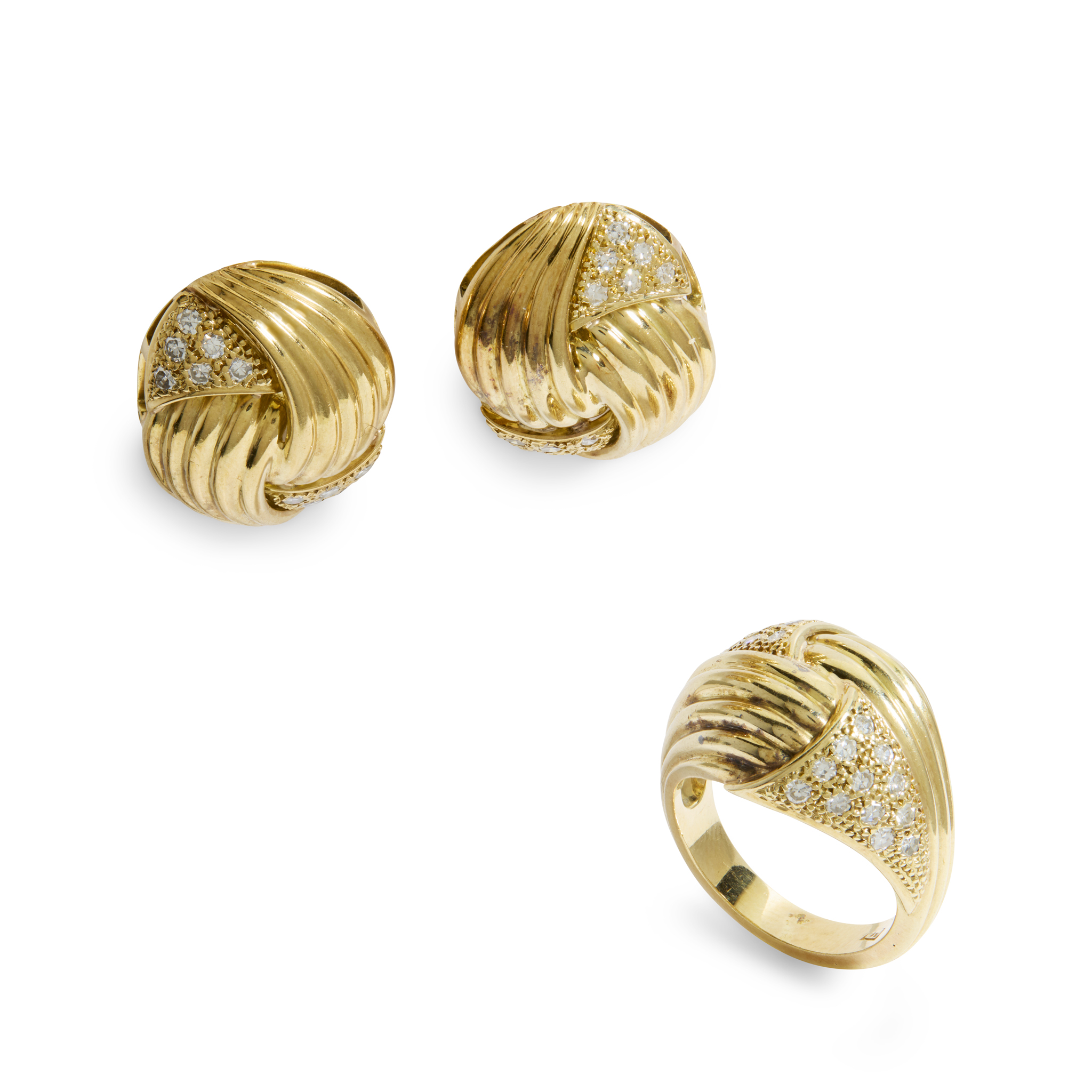 A pair of diamond earrings and a matching ring