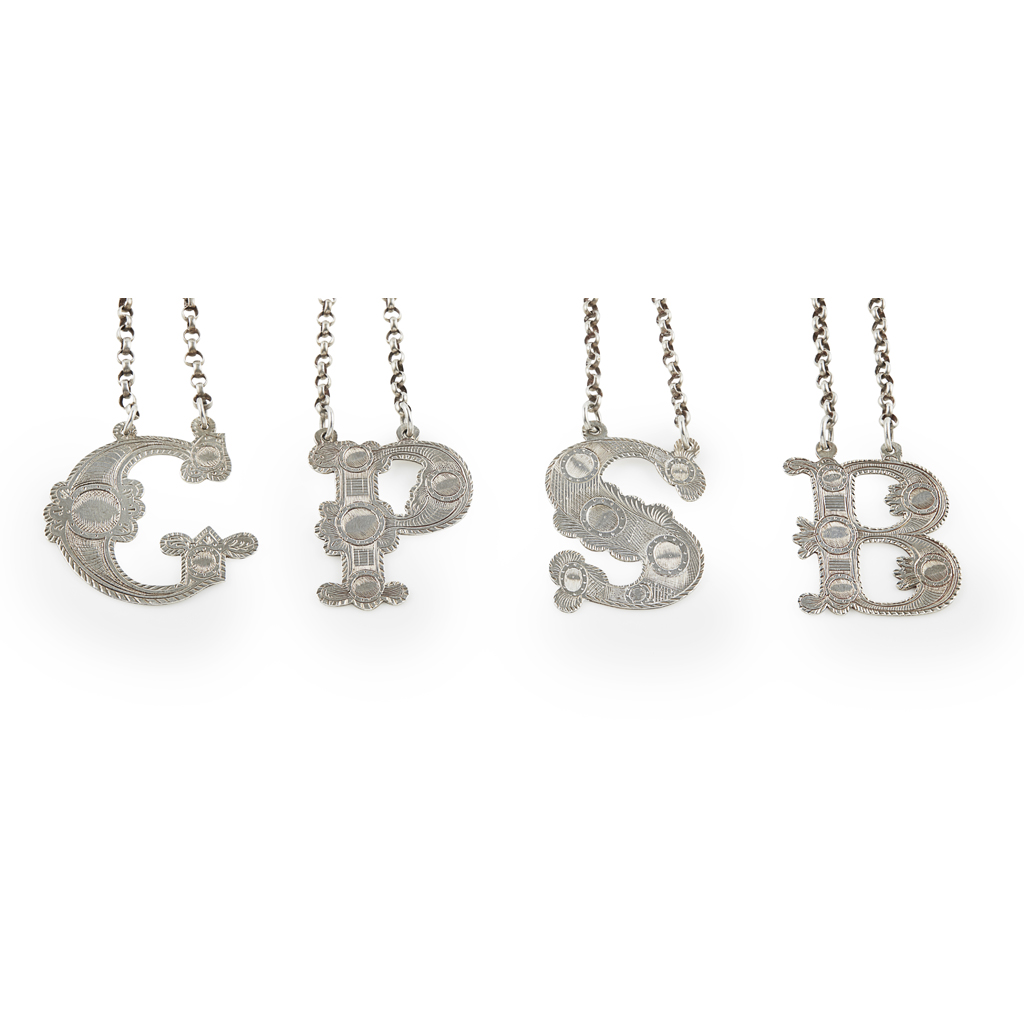 A SET OF FOUR SPIRIT LABELS