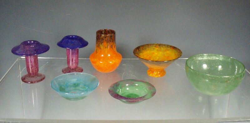 A collection of Monart glass