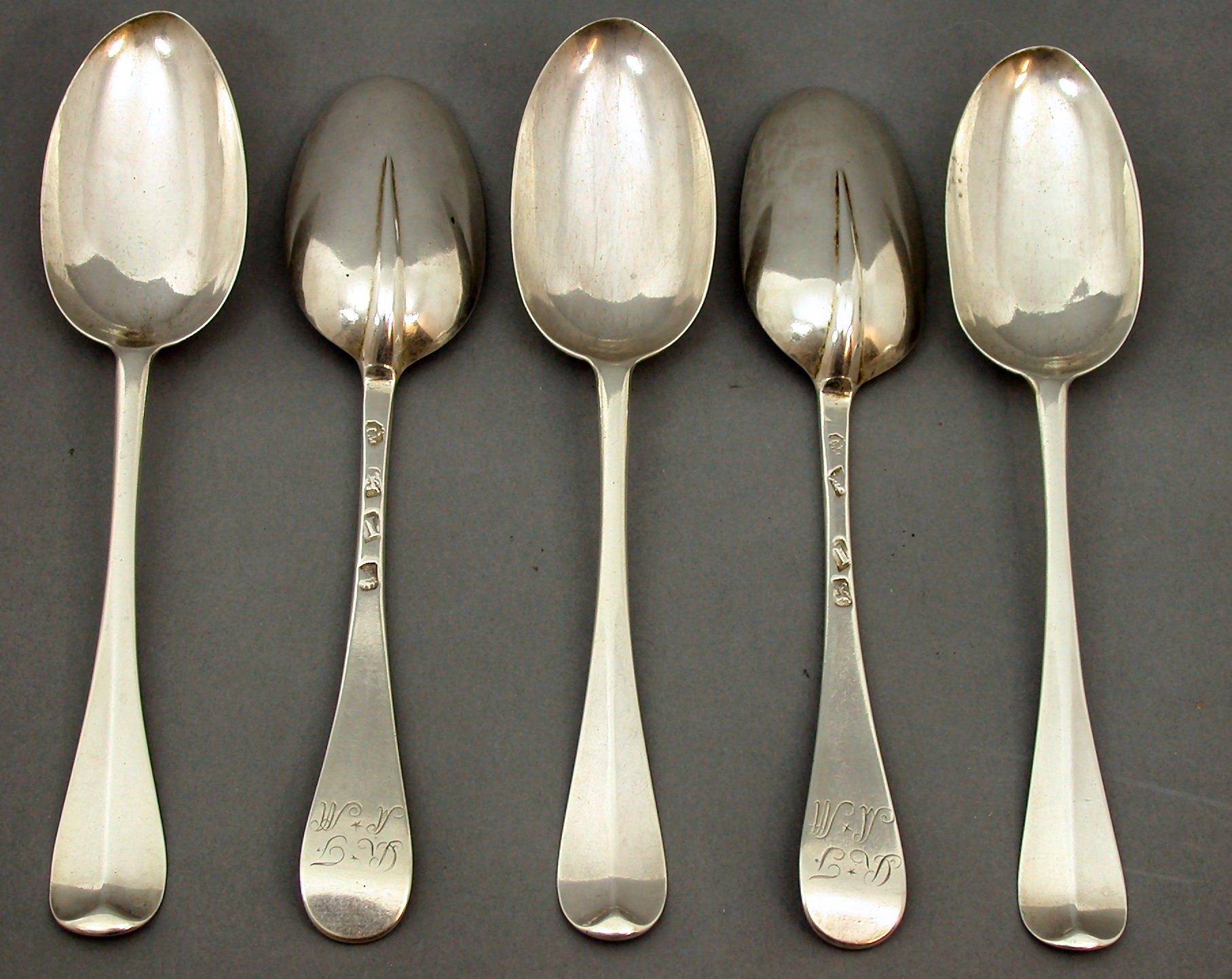 A George I part set of 5 tablespoons,