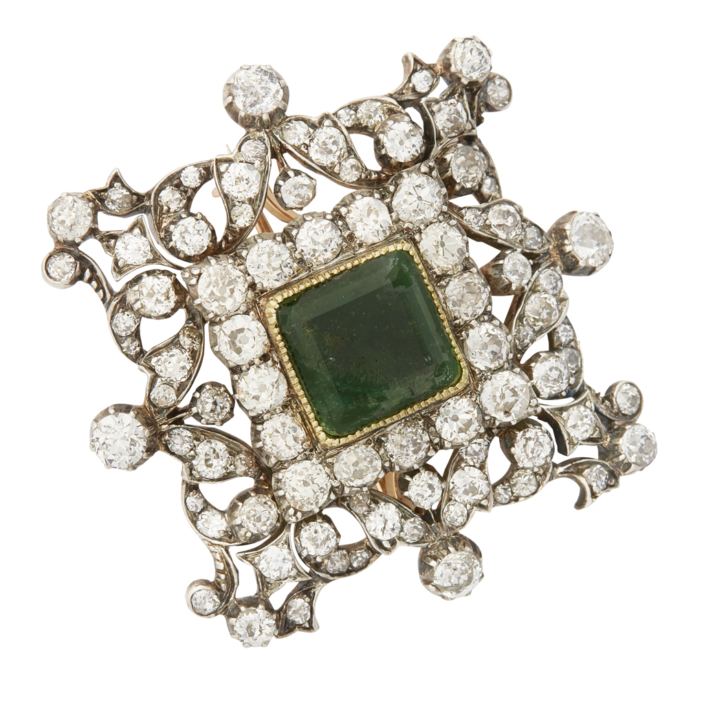 A Victorian diamond and imitation emerald set brooch