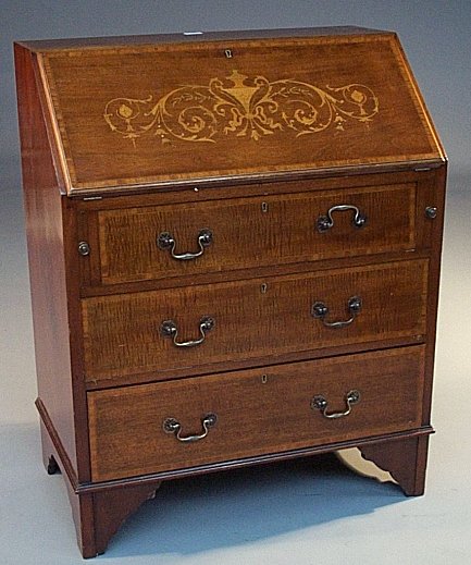 A mahogany boxwood strung bureau