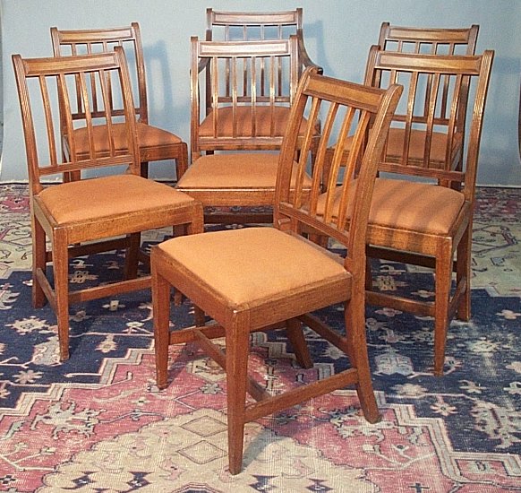 A set of seven mahogany 19th century dining chairs