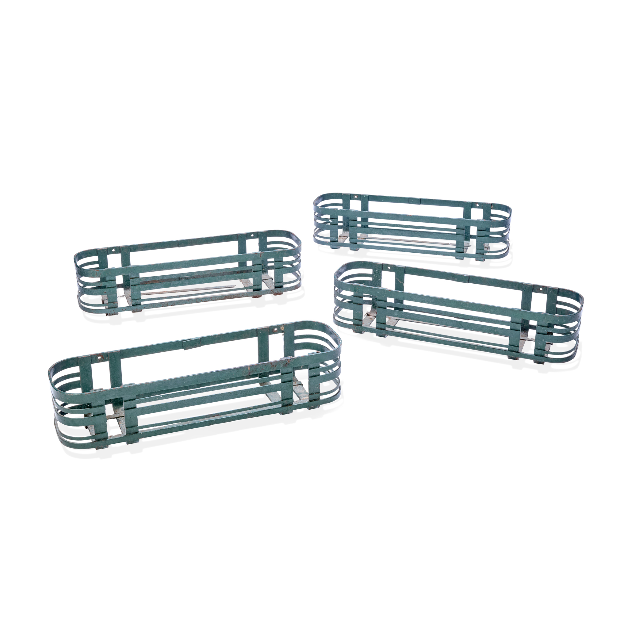 SET OF FOUR STRAPWORK IRON WINDOW BASKETS