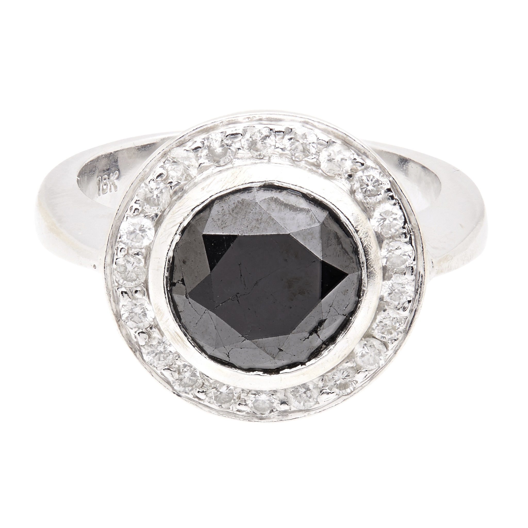 A black and colourless diamond set cluster ring