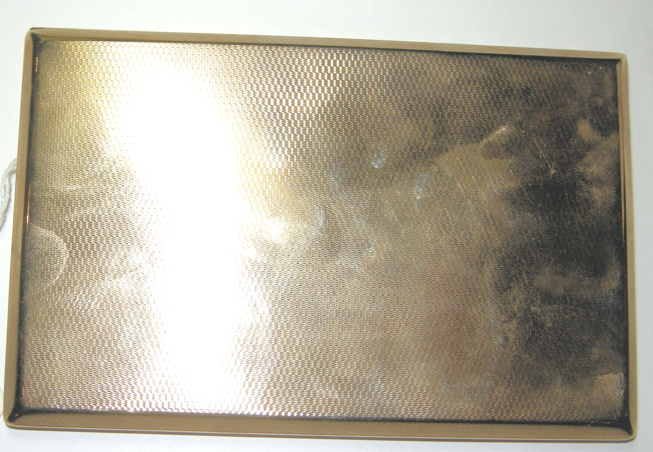 A 9ct gold cigarette case