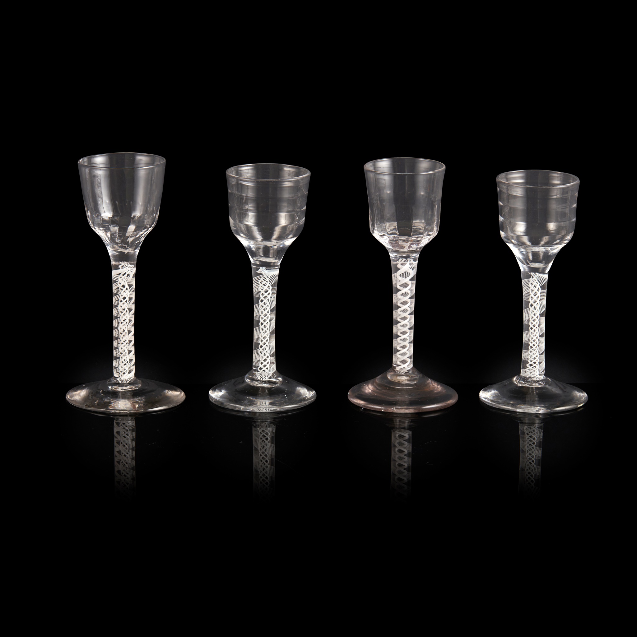 FOUR GEORGIAN OPAQUE-TWIST STEM WINE GLASSES