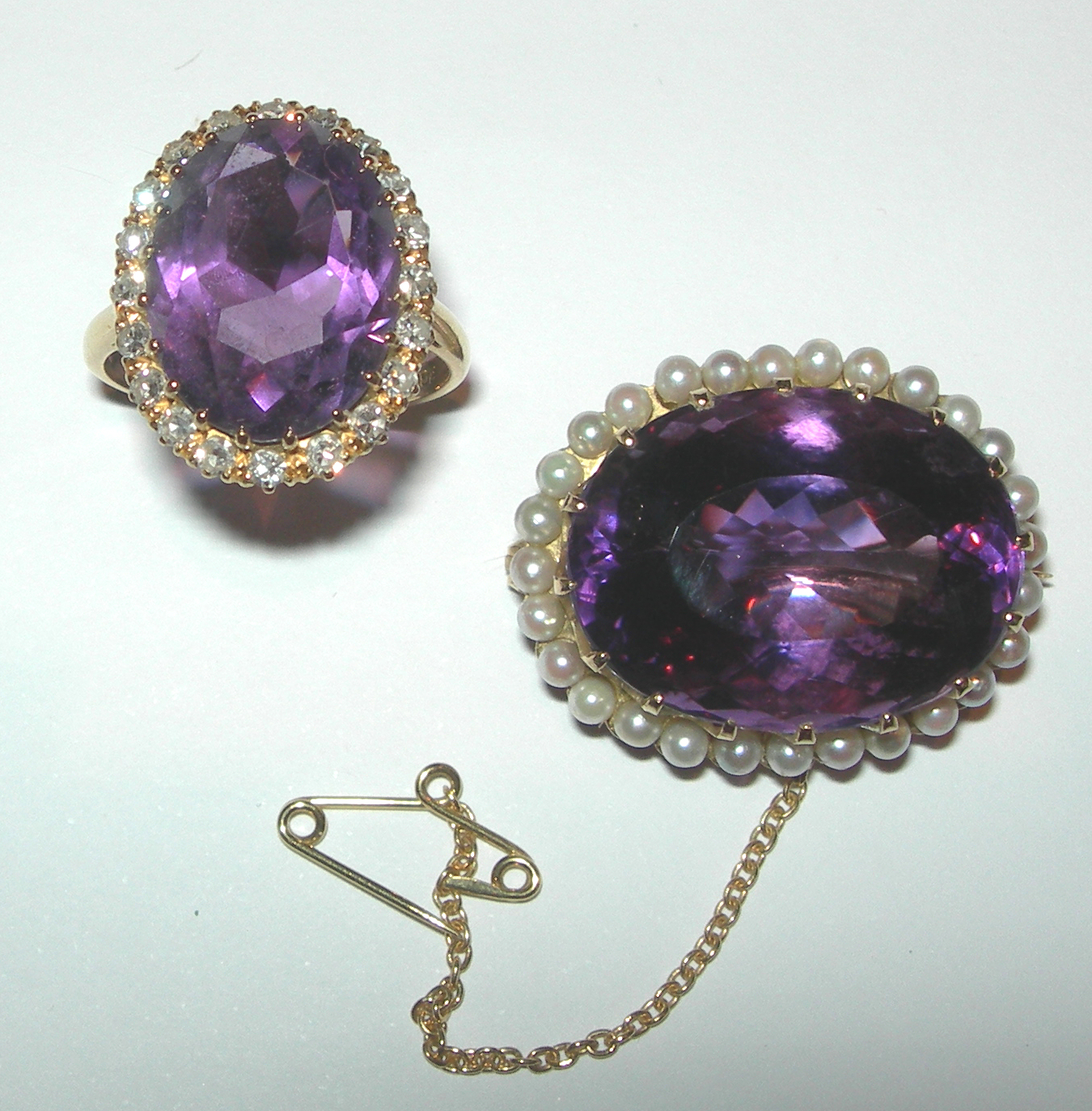 An 18ct gold mounted amethyst and seed pearl set brooch,
