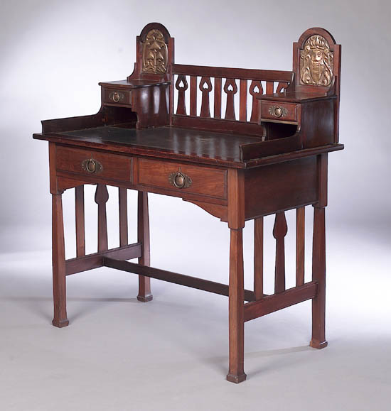 An Art Nouveau mahogany writing desk