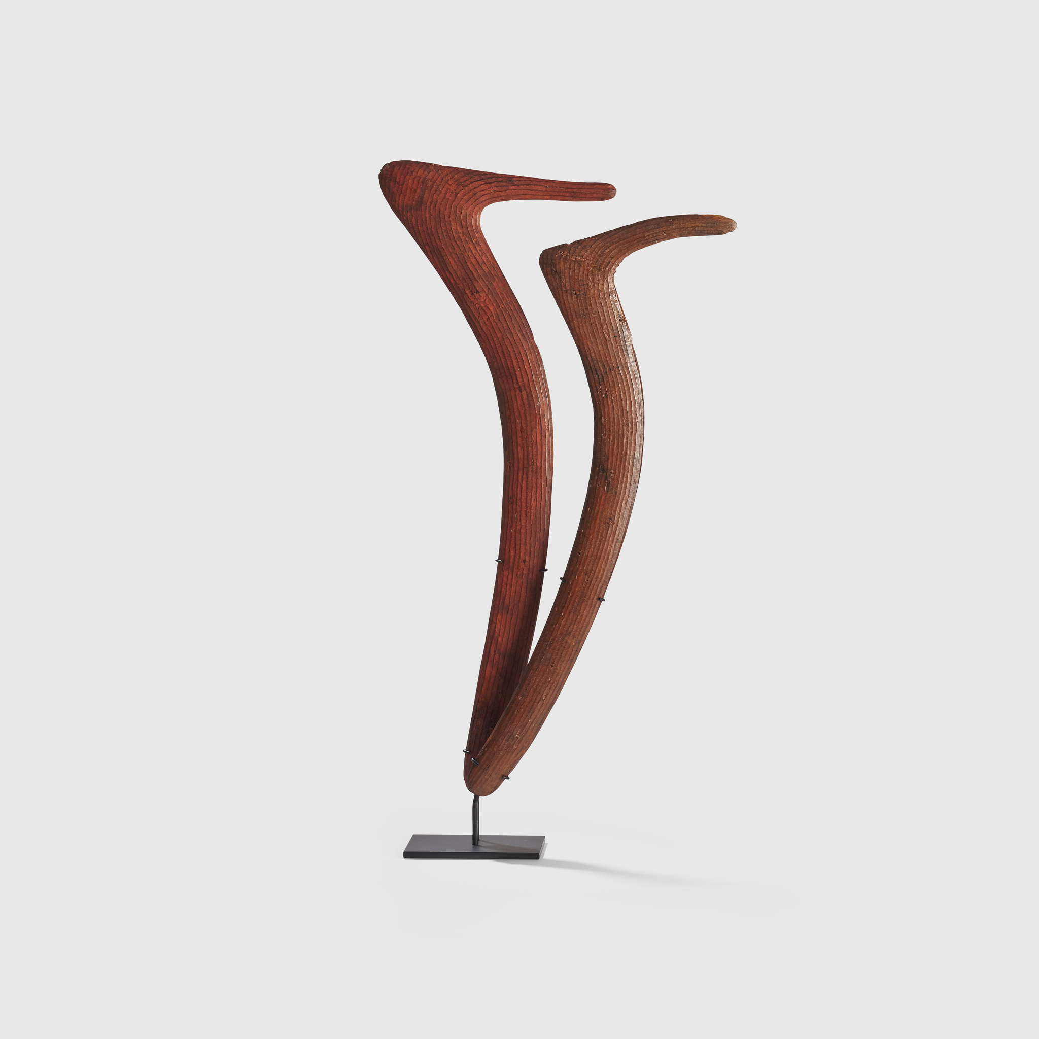 A PAIR OF HOOKED BOOMERANG