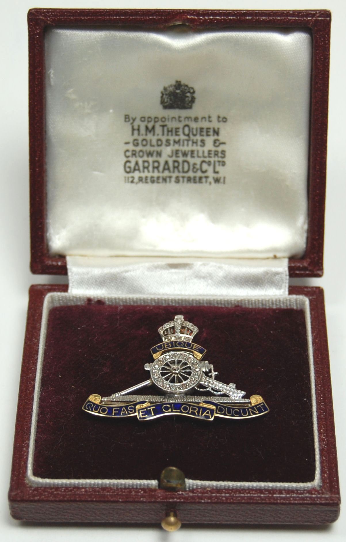 An enamelled and diamond set Royal Artillery badge,