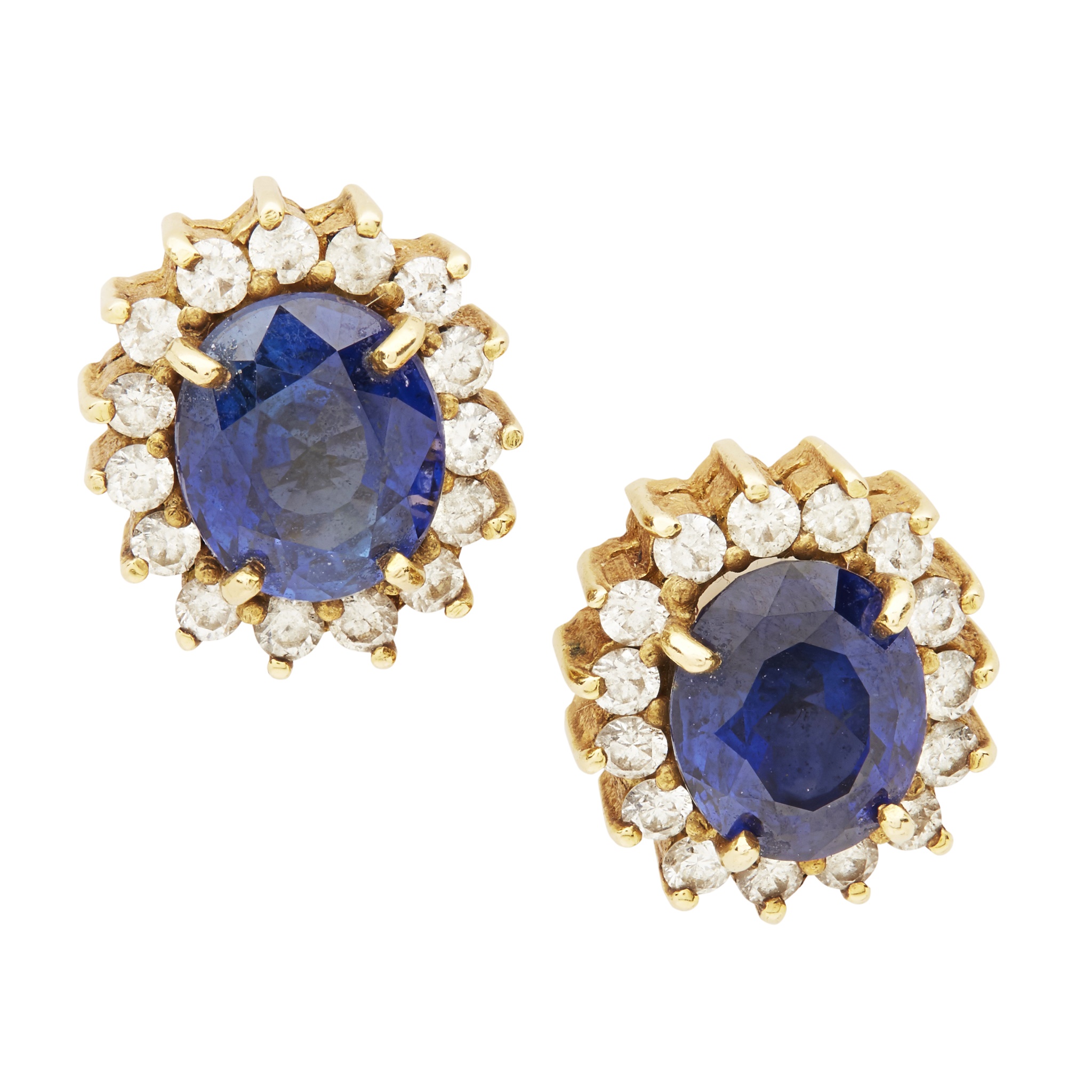 A sapphire and diamond set pendant and matching earrings