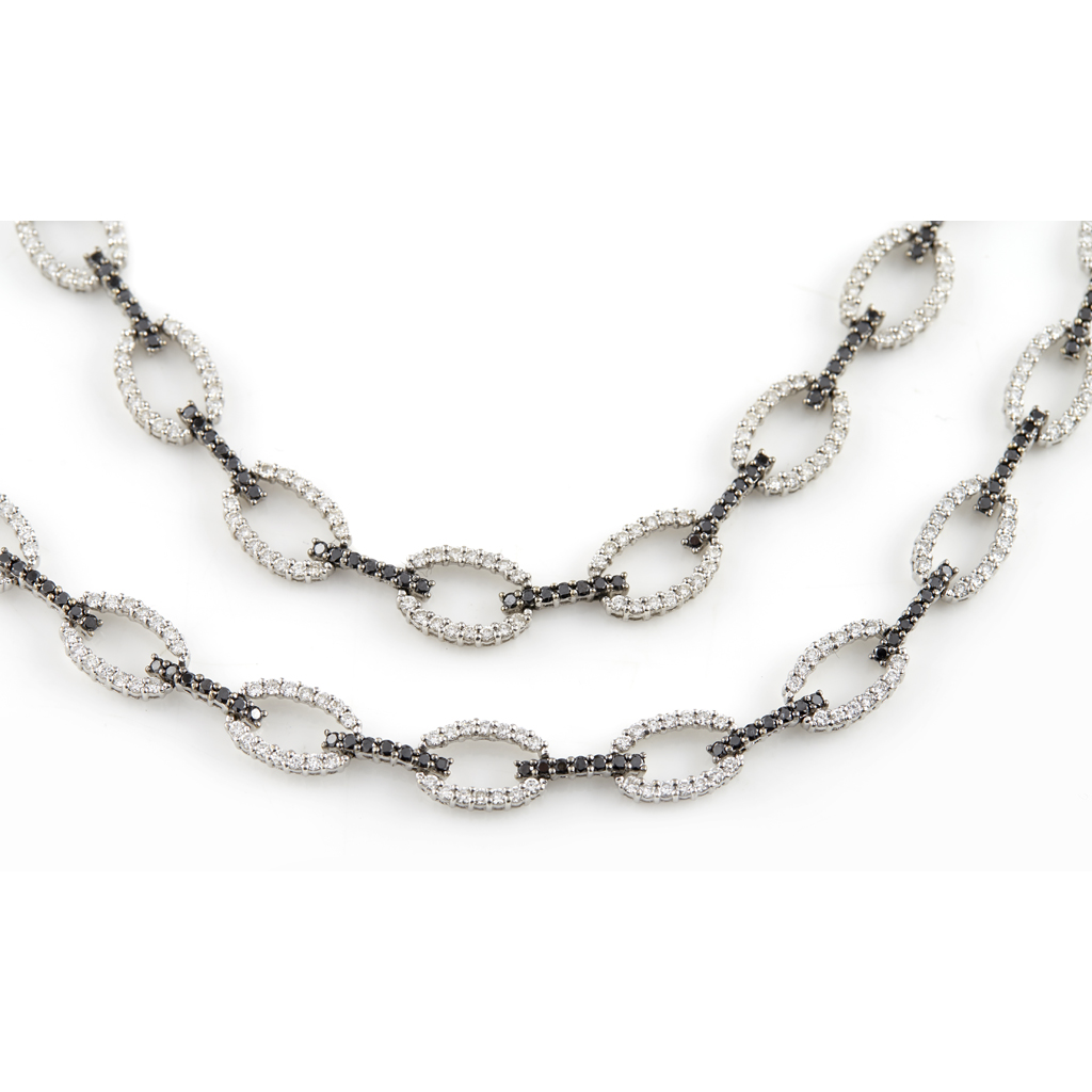 A black and white diamond set necklace and bracelet