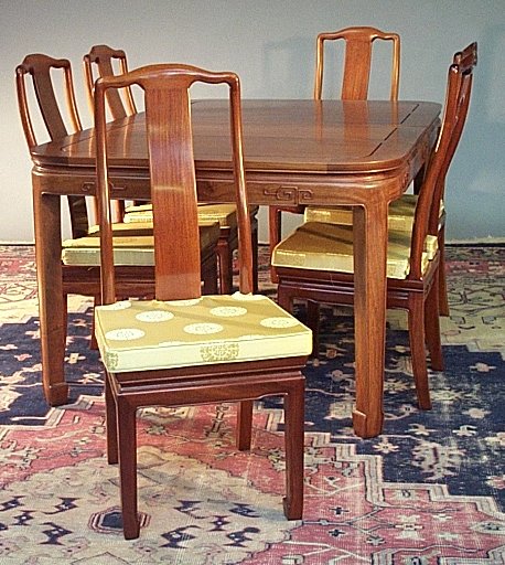 A hardwood extending dining table