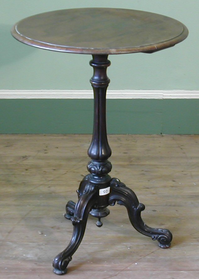 An early Victorian rosewood tripod table,