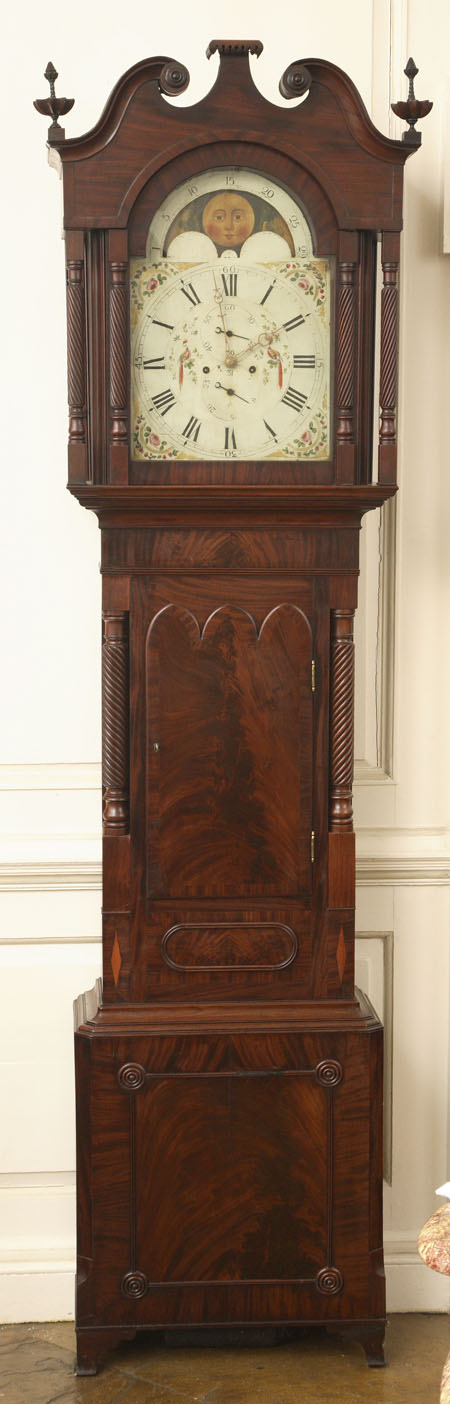 An early 19th century mahogany eight day longcase clock