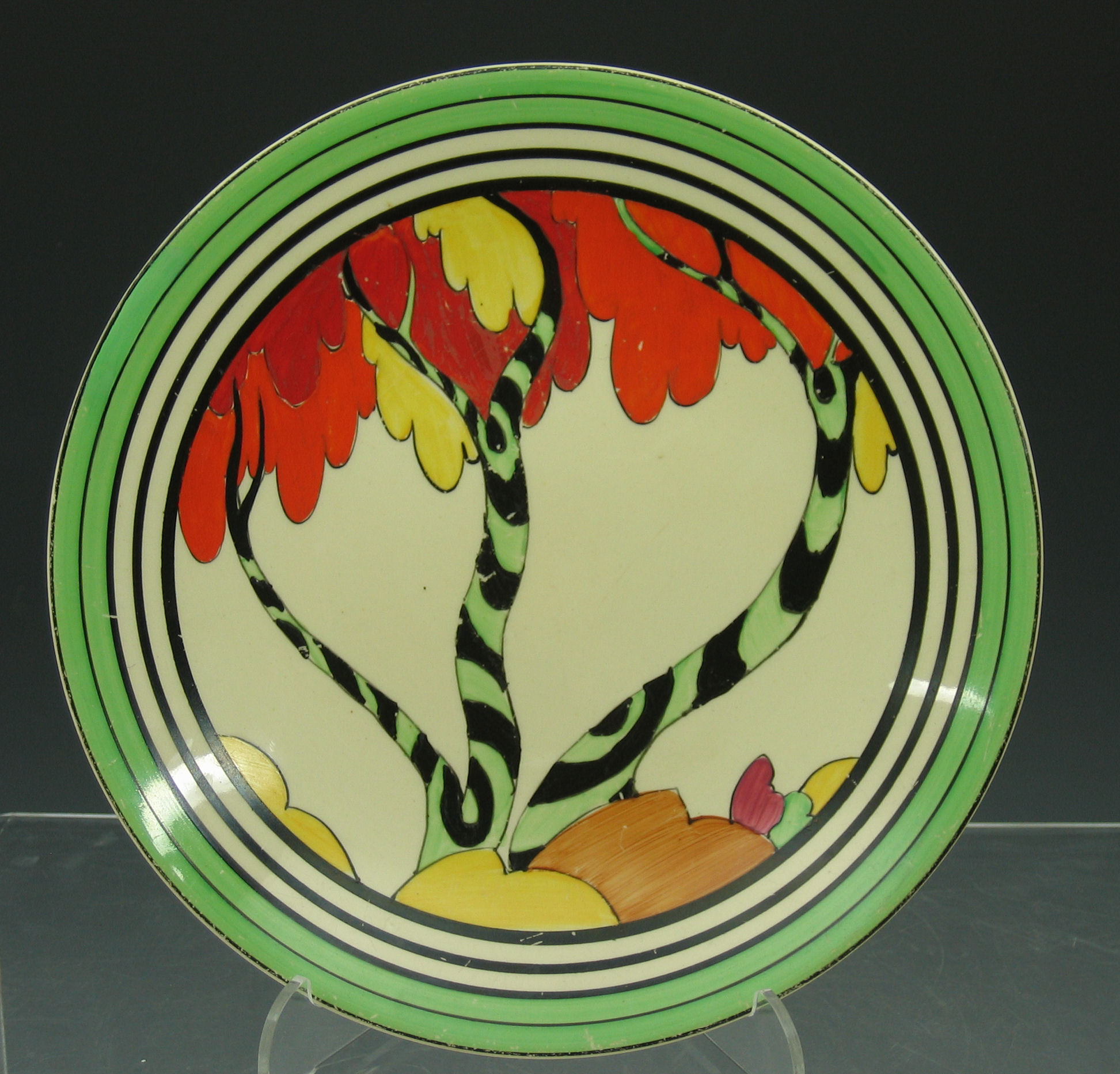 A Clarice Cliff circular plate,