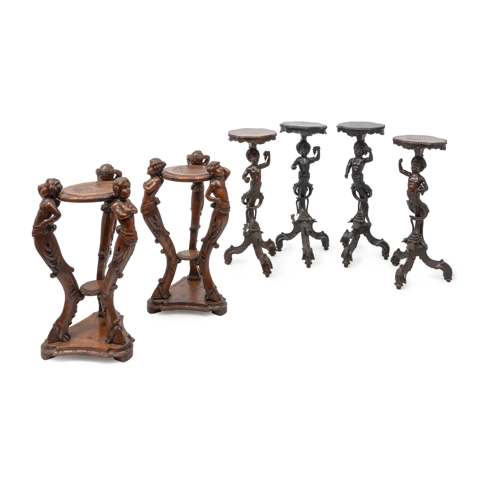 A SET OF FOUR MAHOGANY FIGURAL TORCHERES