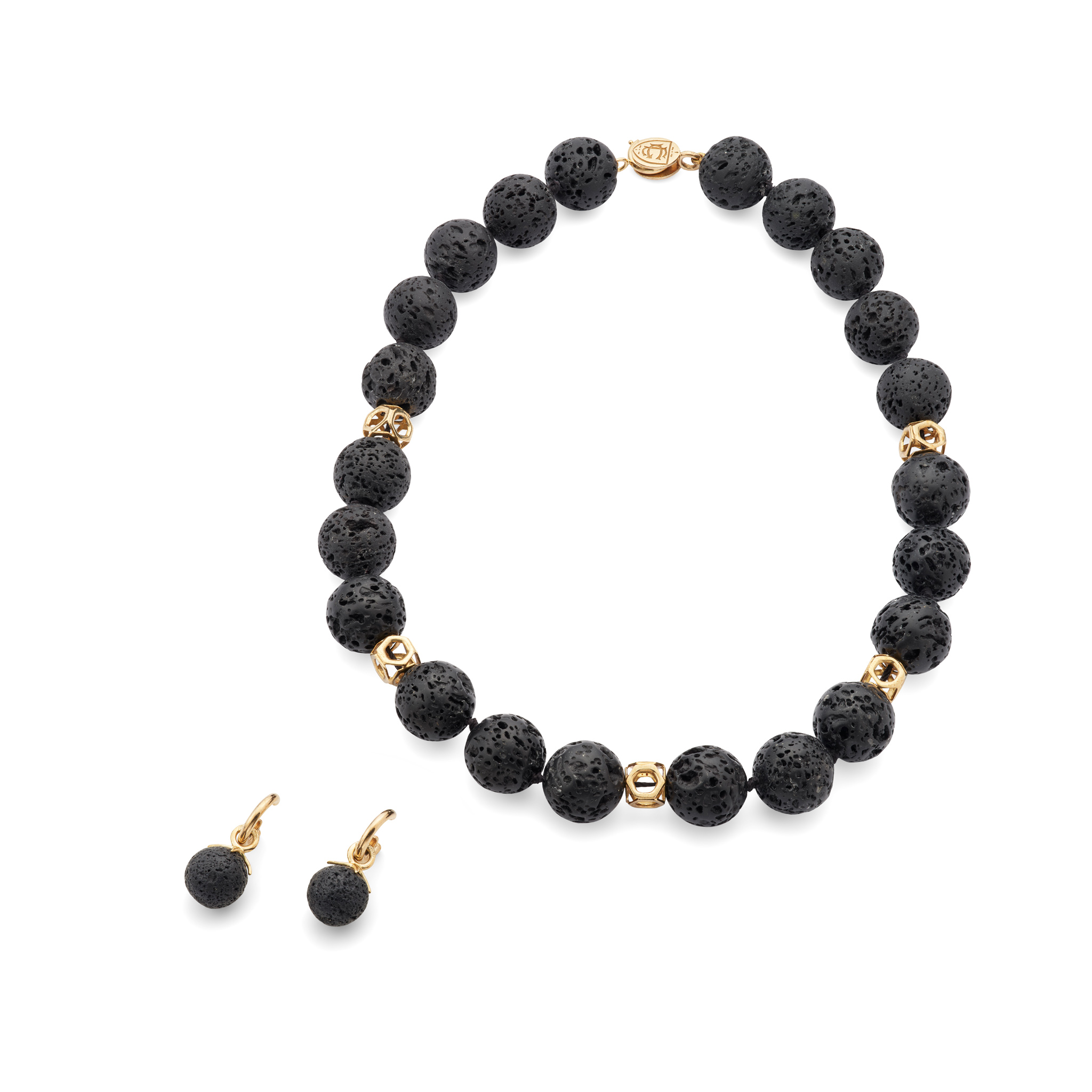 Cassandra Goad: A gold and lava necklace and a pair of 'Astrea' hoops with lava drops