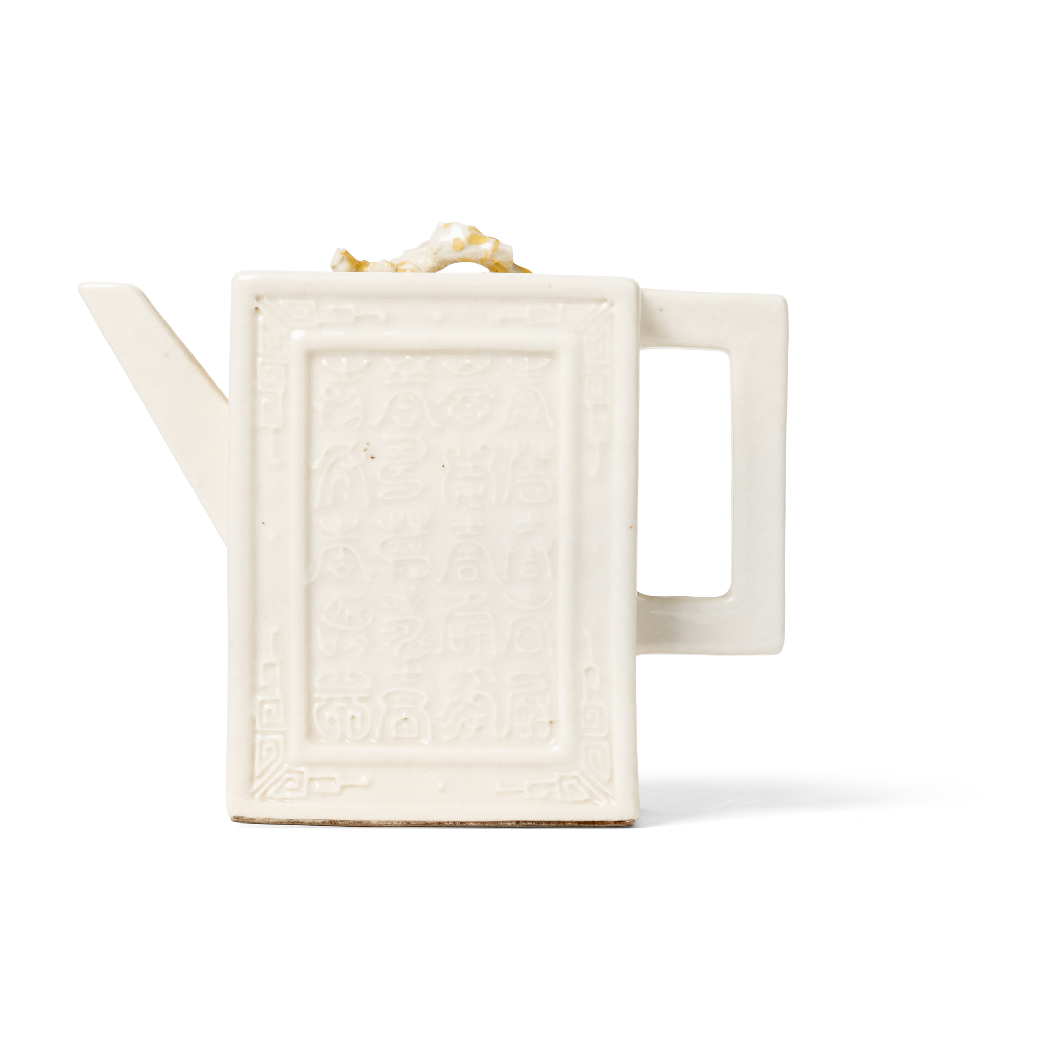 CHINESE MOULDED SOFT-PASTE WHITE-GLAZED ‘LONGEVITY’ TEAPOT
