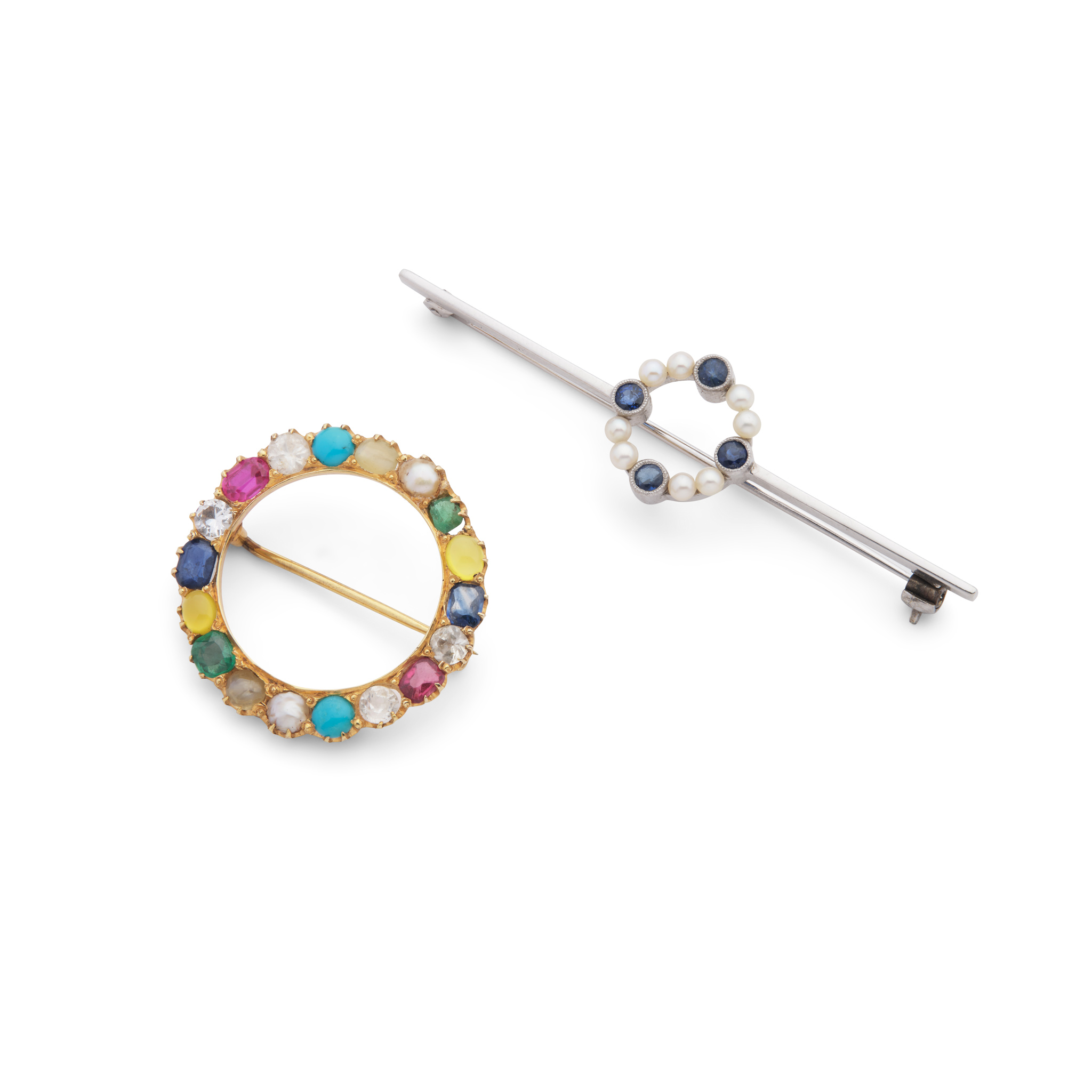 Two early 20th century circular brooches