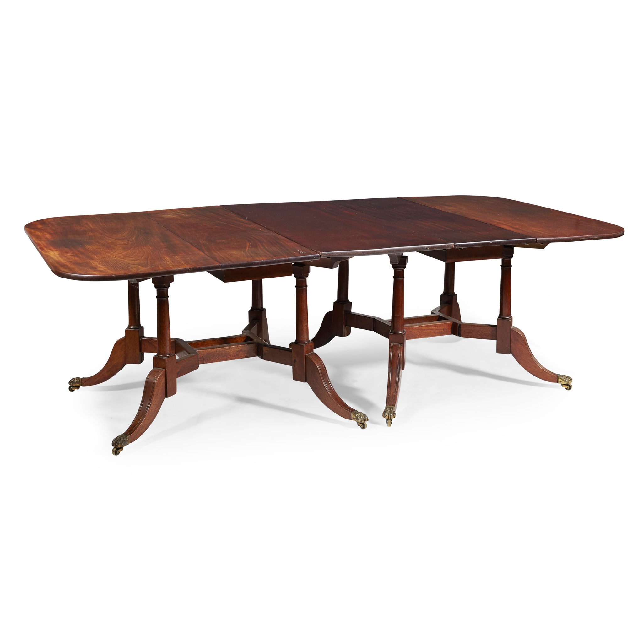 LATE GEORGE III MAHOGANY 'CUMBERLAND' DINING TABLE