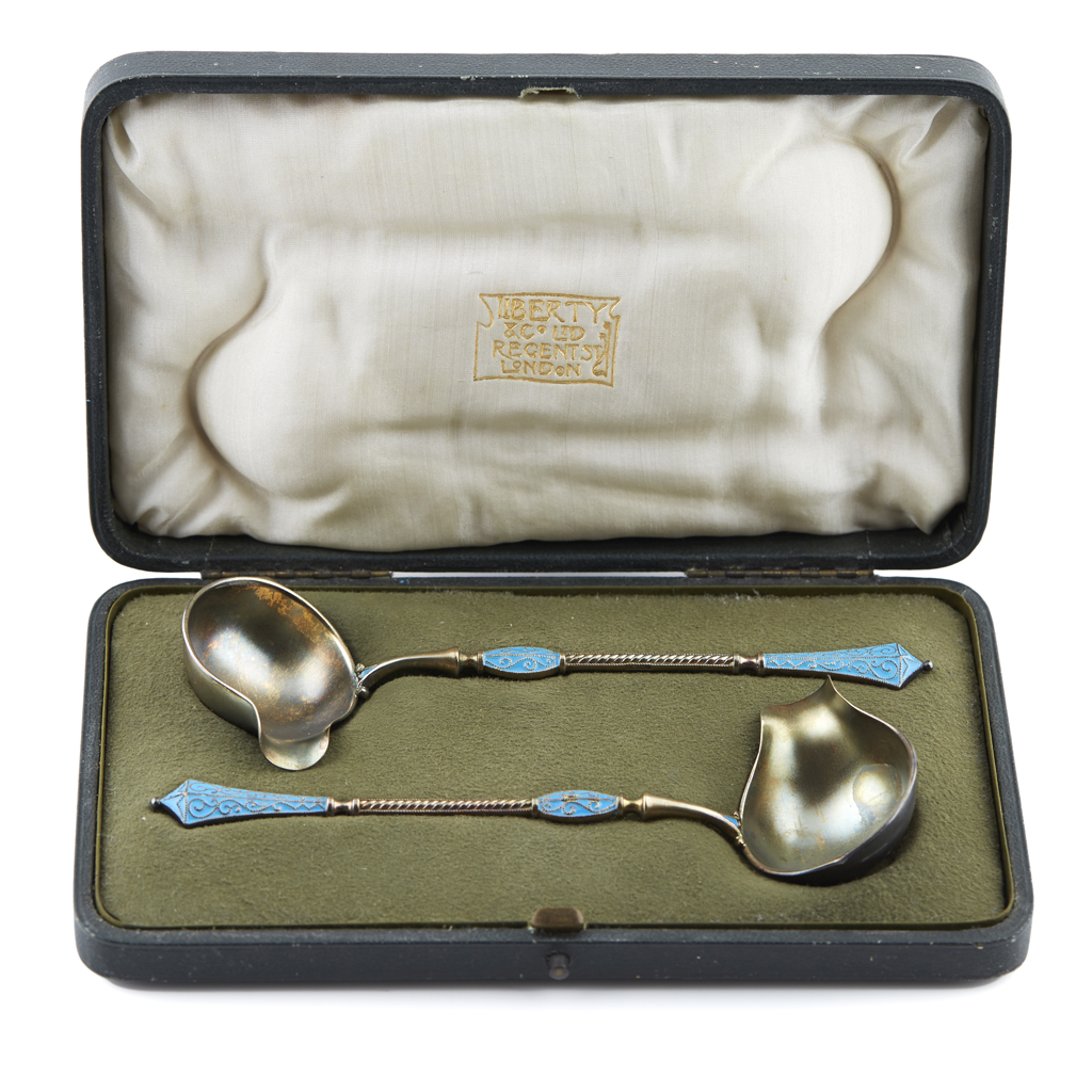 LIBERTY INTEREST - A cased set of cream ladles