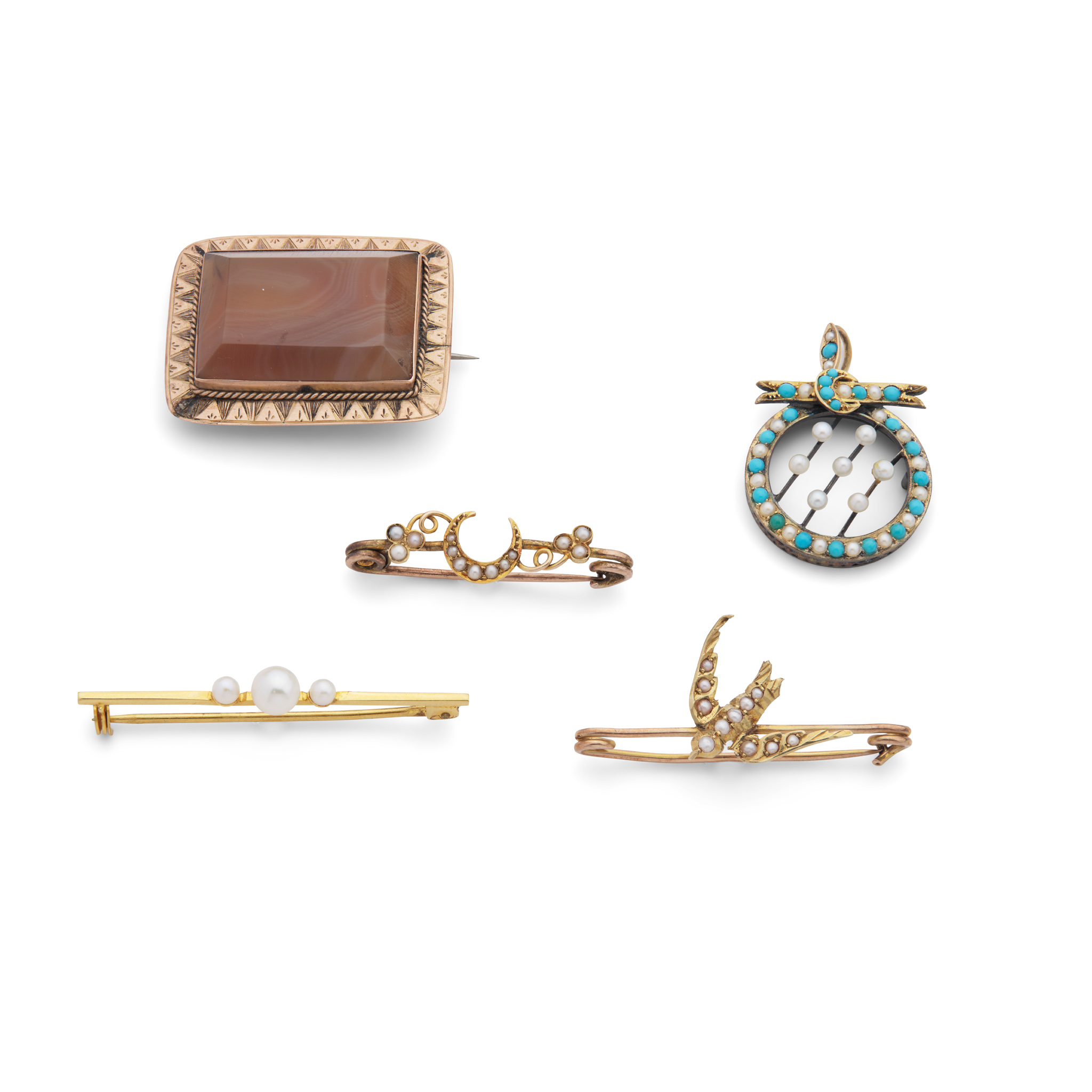 A collection of gem-set brooches