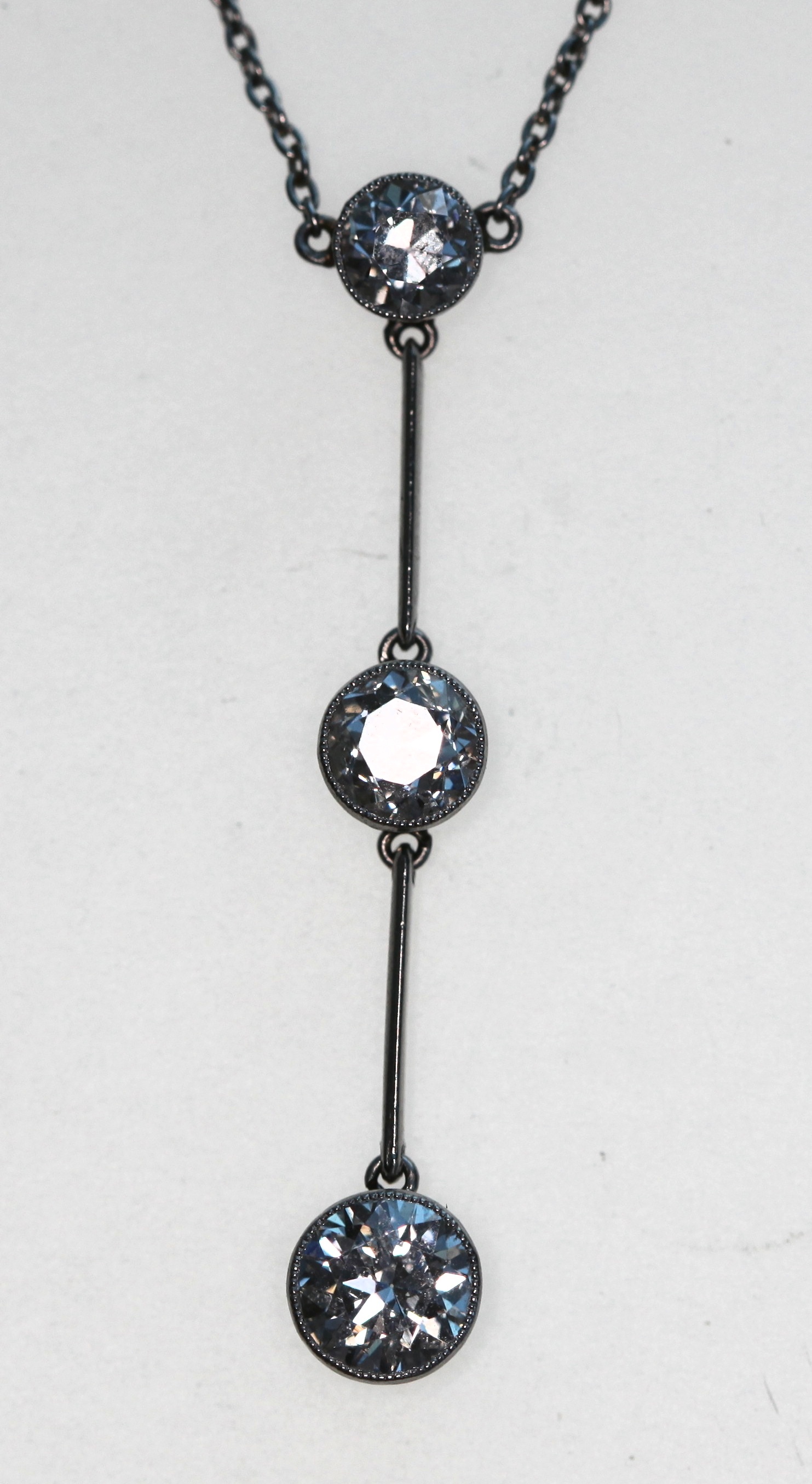 An early 20th century diamond set necklace