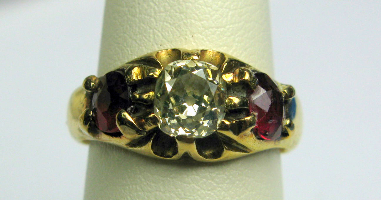 A 19th century 18ct gold mounted three-stone ring