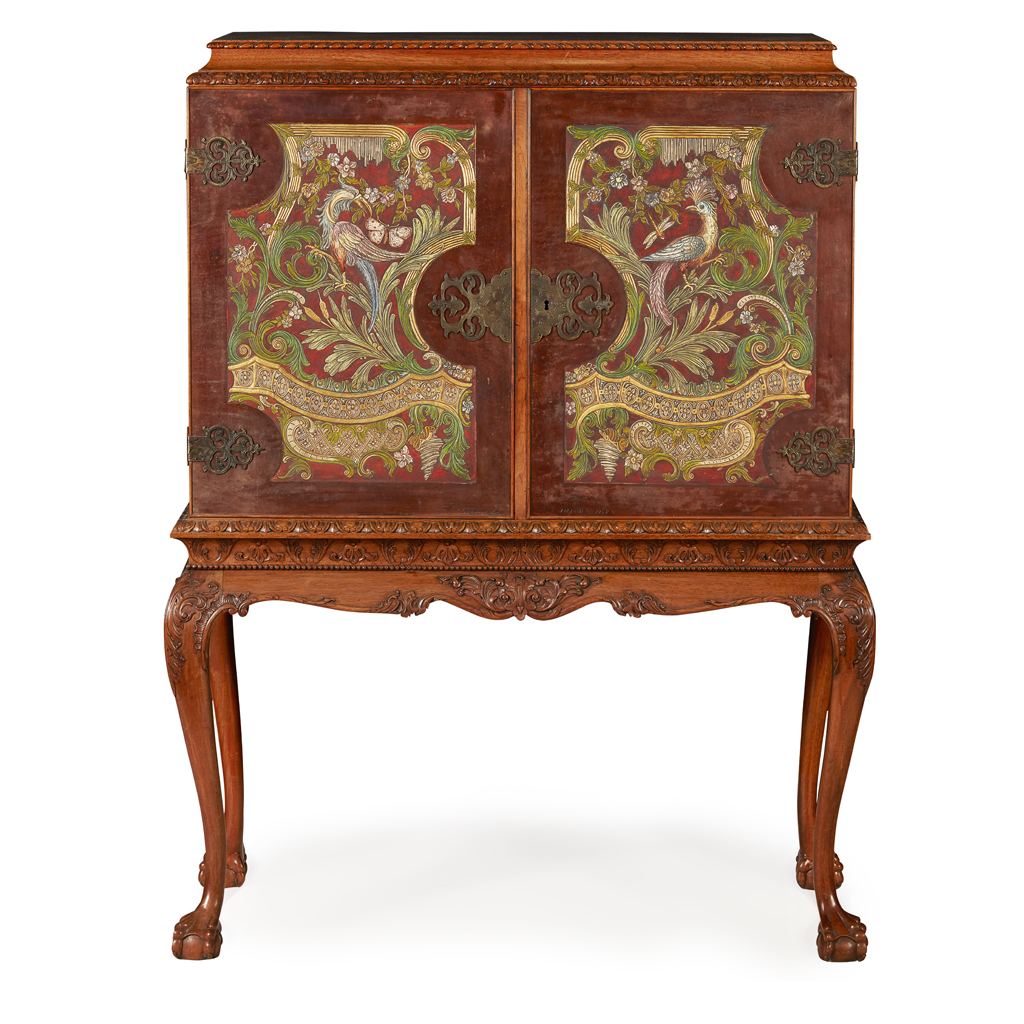 CONTINENTAL WALNUT, BIRCH AND STAINED LEATHER CABINET ON STAND