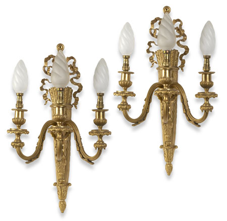 A pair of 19th century gilt brass three light wall appliques