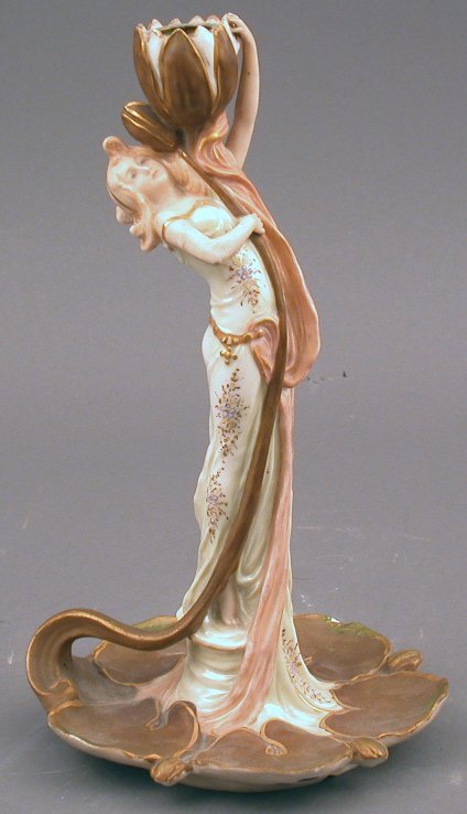A Royal Dux figural candlestick