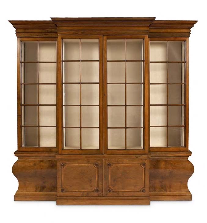 A figured walnut breakfront library bookcase,