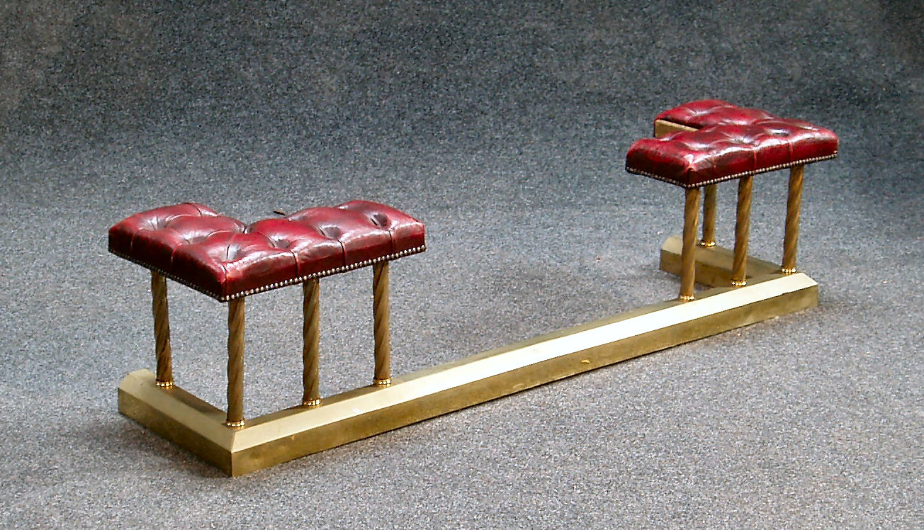 A 20th century brass club fender