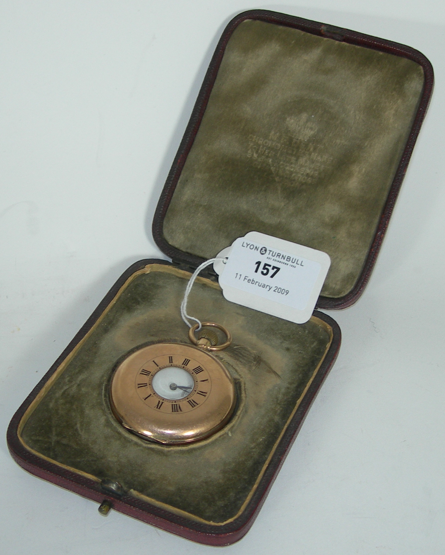A 9ct rose gold half-hunter cased pocket watch,