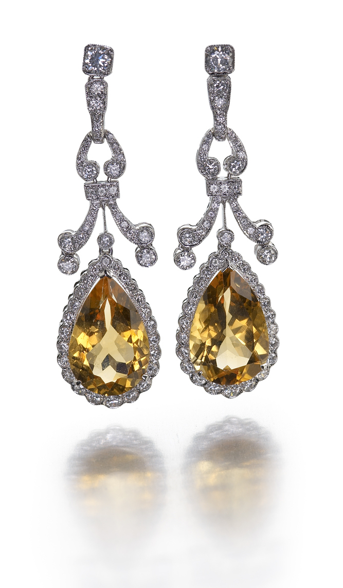 A pair of citrine and diamond pendant earrings,