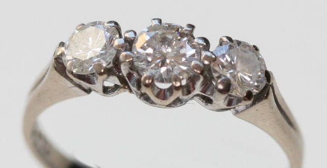 A three stone diamond ring