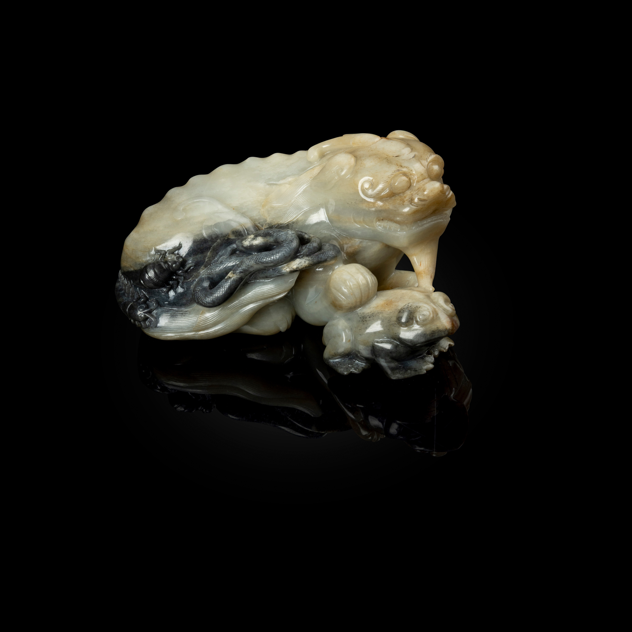CHINESE PALE CELADON AND BLACK JADE GROUP OF LUDUAN WITH FOUR POISONS