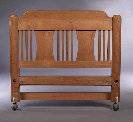 A pair of Arts & Crafts oak single beds