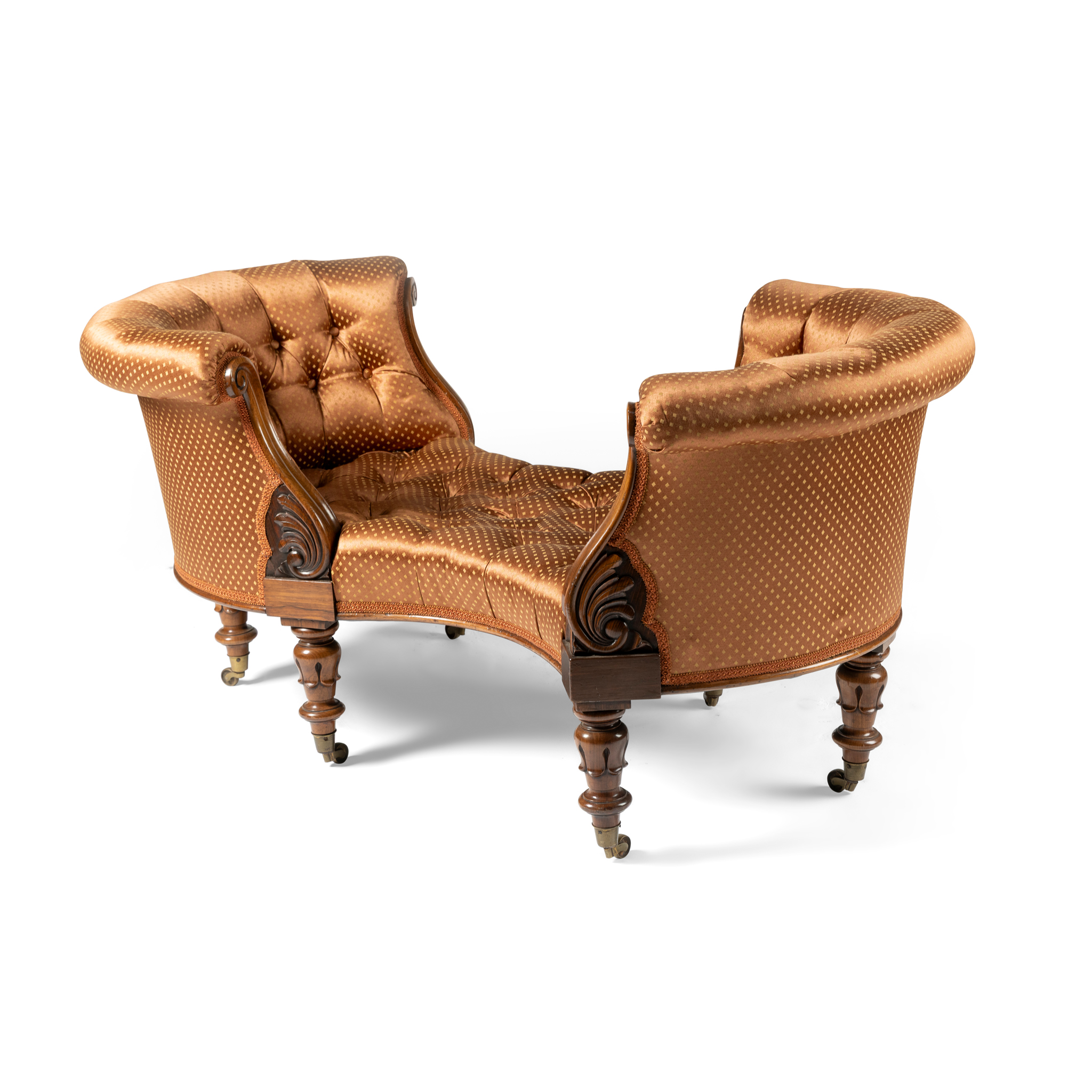 AN EARLY VICTORIAN WALNUT AND BUTTON-UPHOLSTERED LOVE SEAT