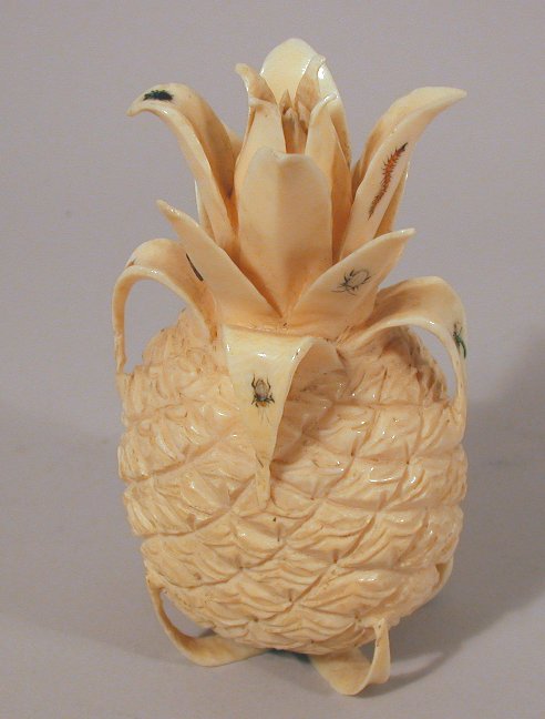 A Japanese carved ivory shibyama decorated pineapple