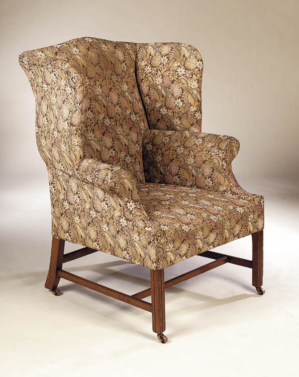 A George III mahogany wing chair,