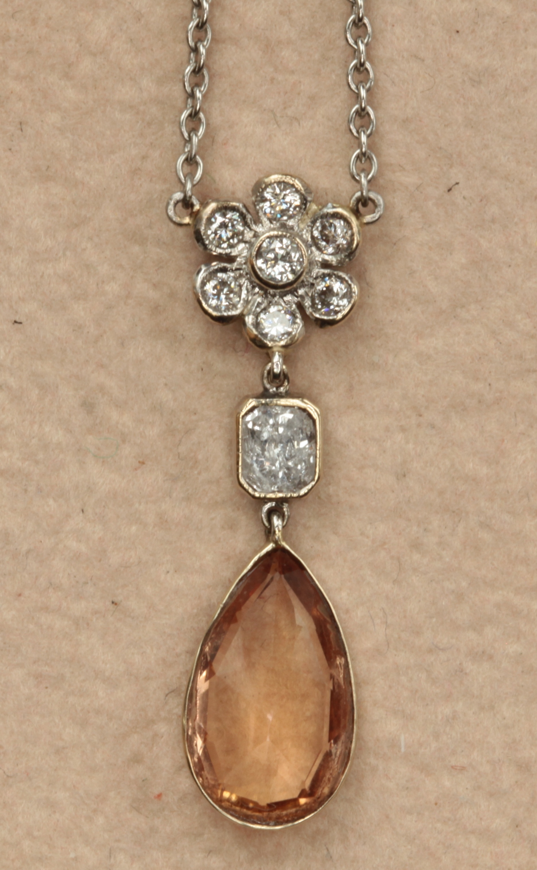 A sherry topaz and diamond set necklace