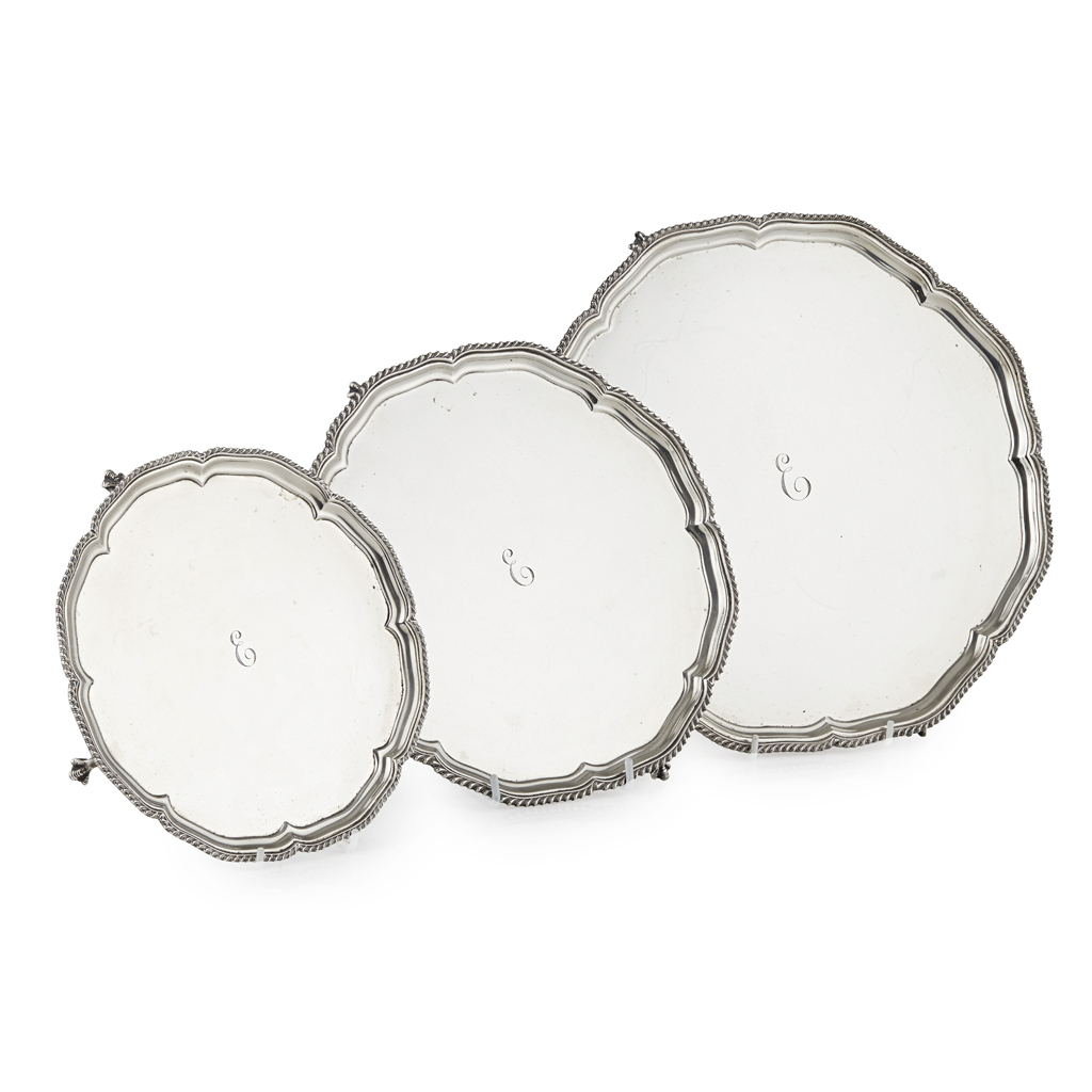 A matched set of three graduated salvers