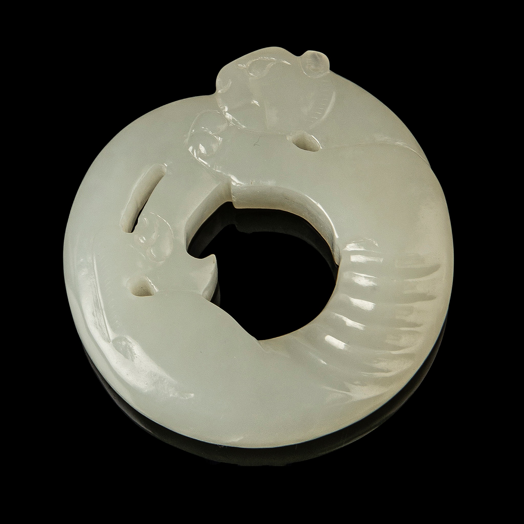 WHITE JADE CARVING OF A TIGER PENDANT